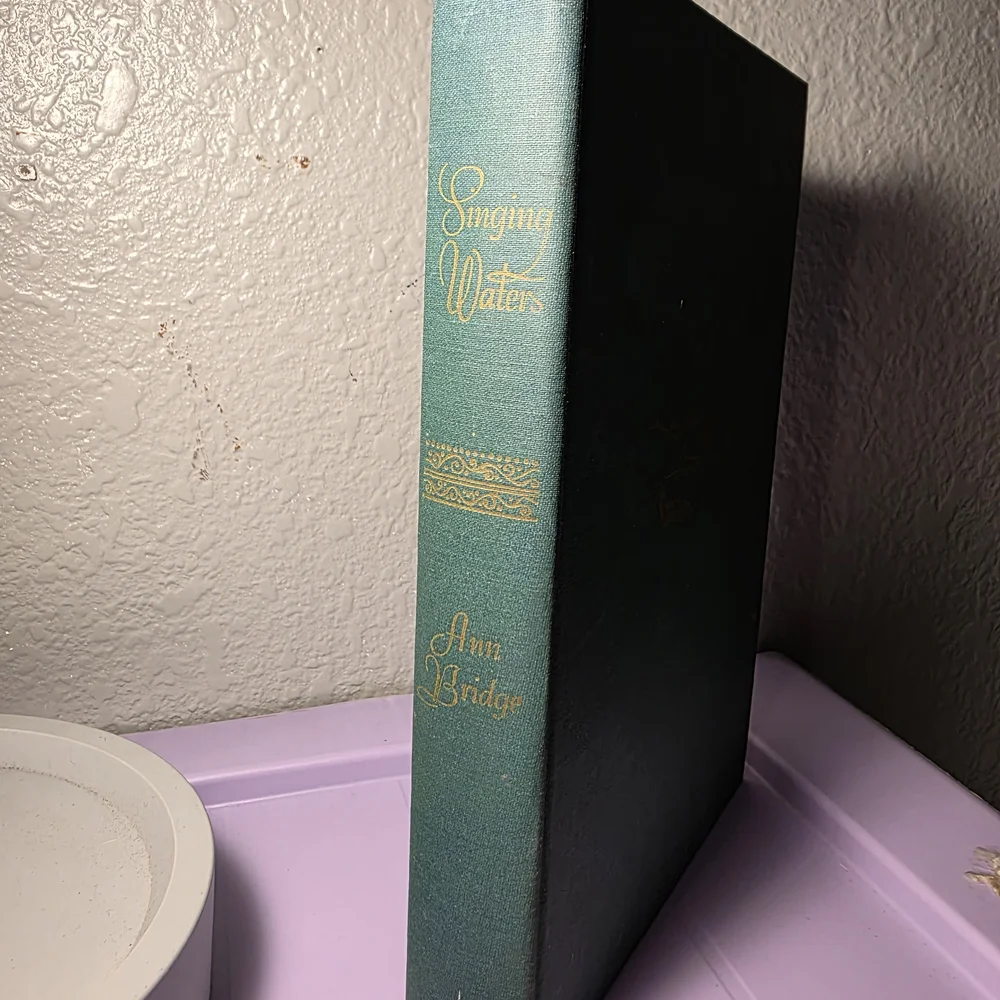 Green Hardcover Book with Gold Design